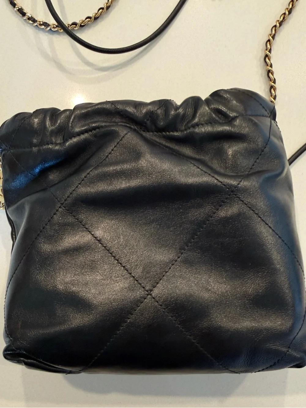 CHANEL 22 Black Quilted Leather Crossbody with Pearl-Trim Chain